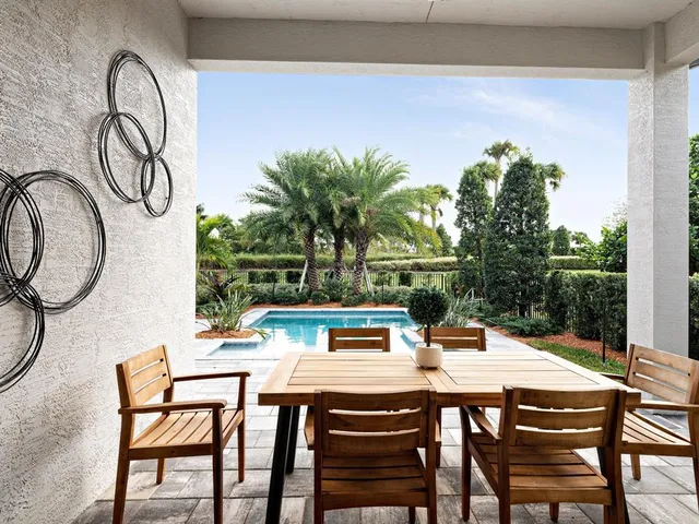 a outdoor dining space with furniture and outdoor space