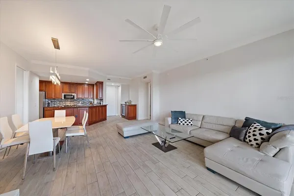 a kitchen with a table and chairs in it