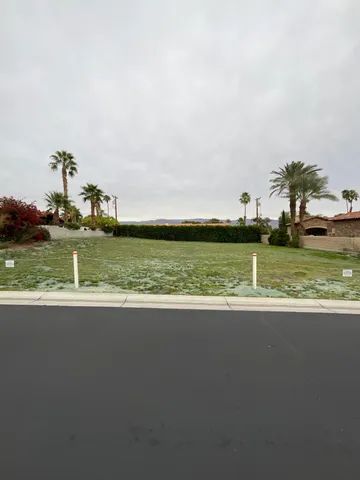 a view of a ocean with a nearby beach