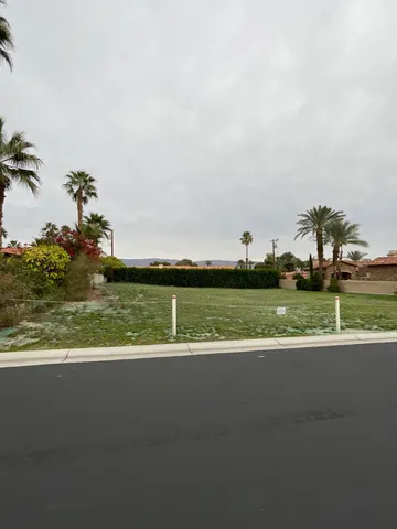 a view of a golf course with a lake