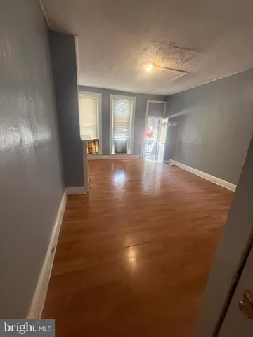 a view of an empty room and window