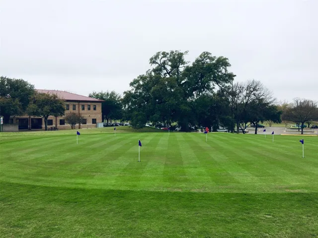 a view of house with a garden