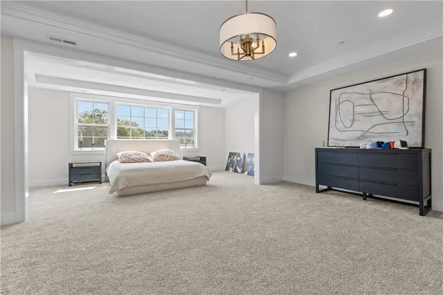 a bed room with a bed and a window