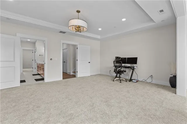 a view of a livingroom with furniture