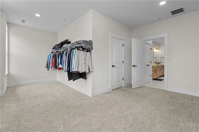 a view of a closet in a room