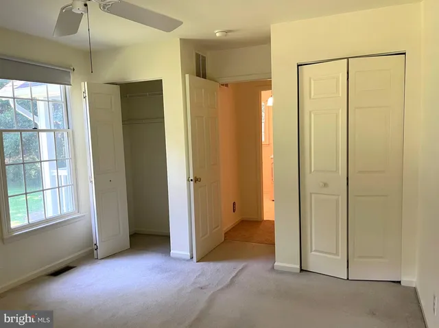 a view of a bathroom with a shower and a tub