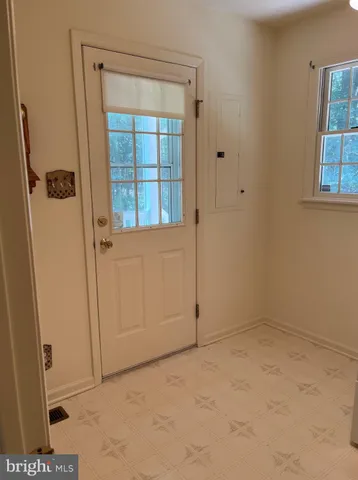 an empty room with windows