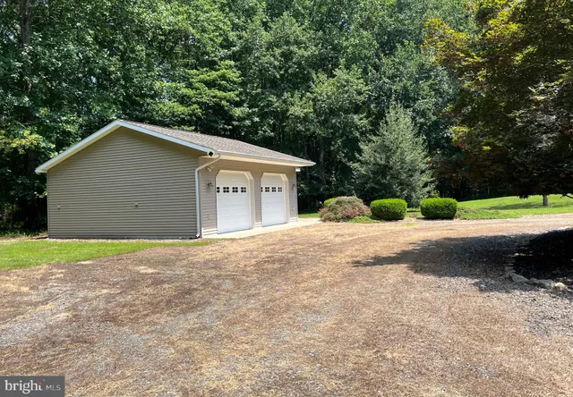 a view of a room with wooden walls