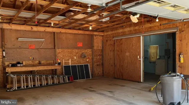 a view of a room with wooden walls