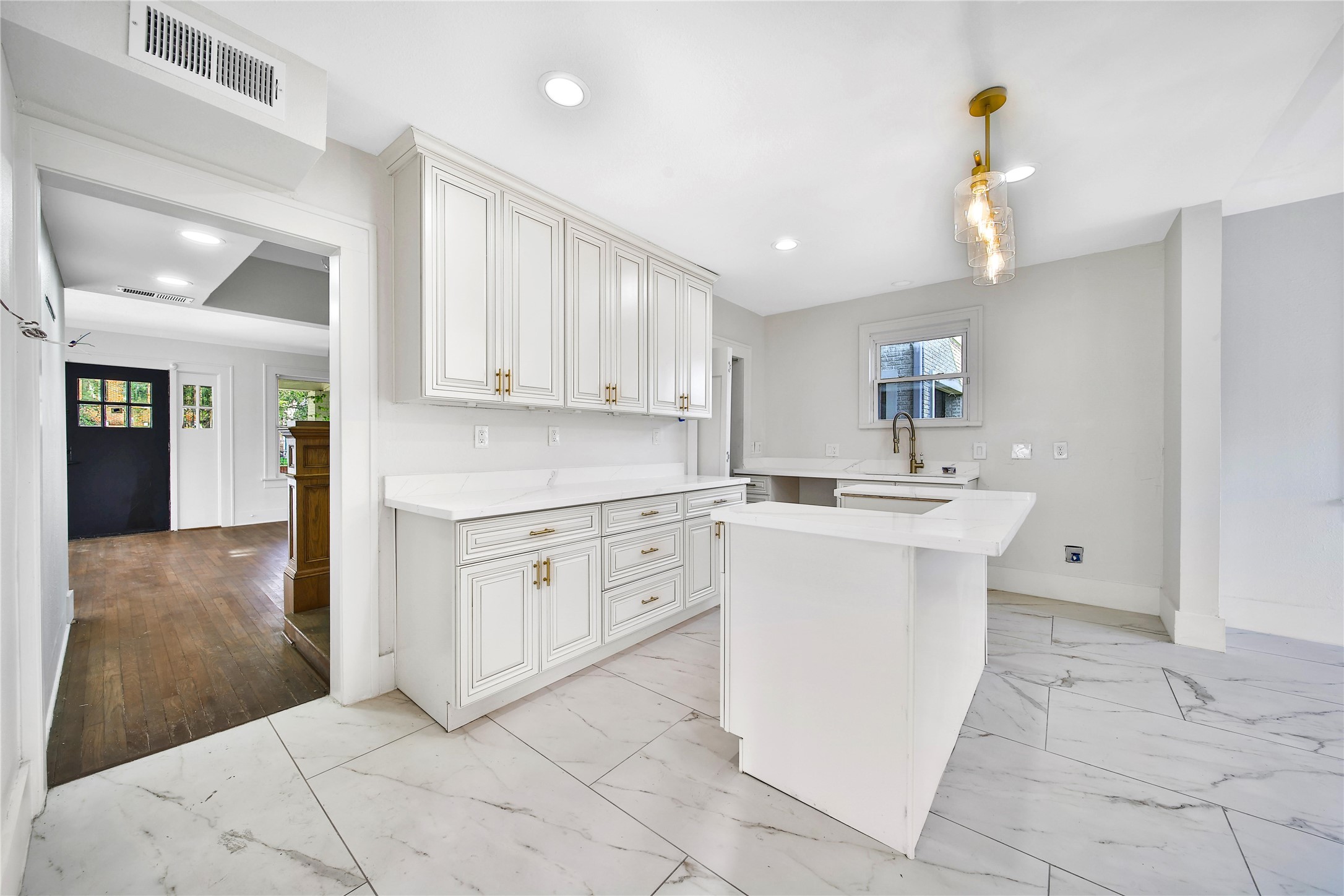 2405 Arbor Street Houston, TX 77004 - Photo 15 of 41 a kitchen with a sink and cabinets