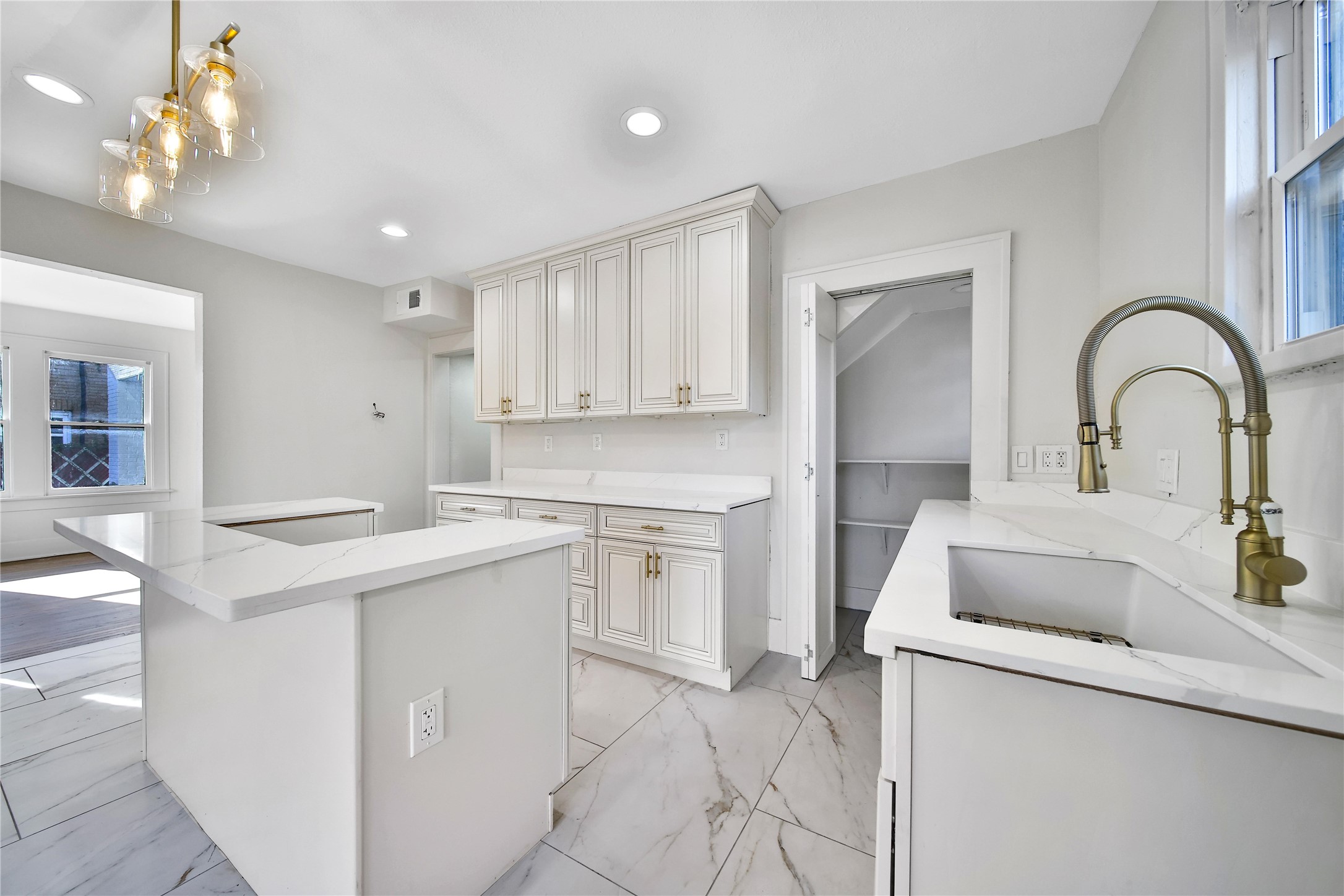 2405 Arbor Street Houston, TX 77004 - Photo 18 of 41 a kitchen with a sink stove and cabinets