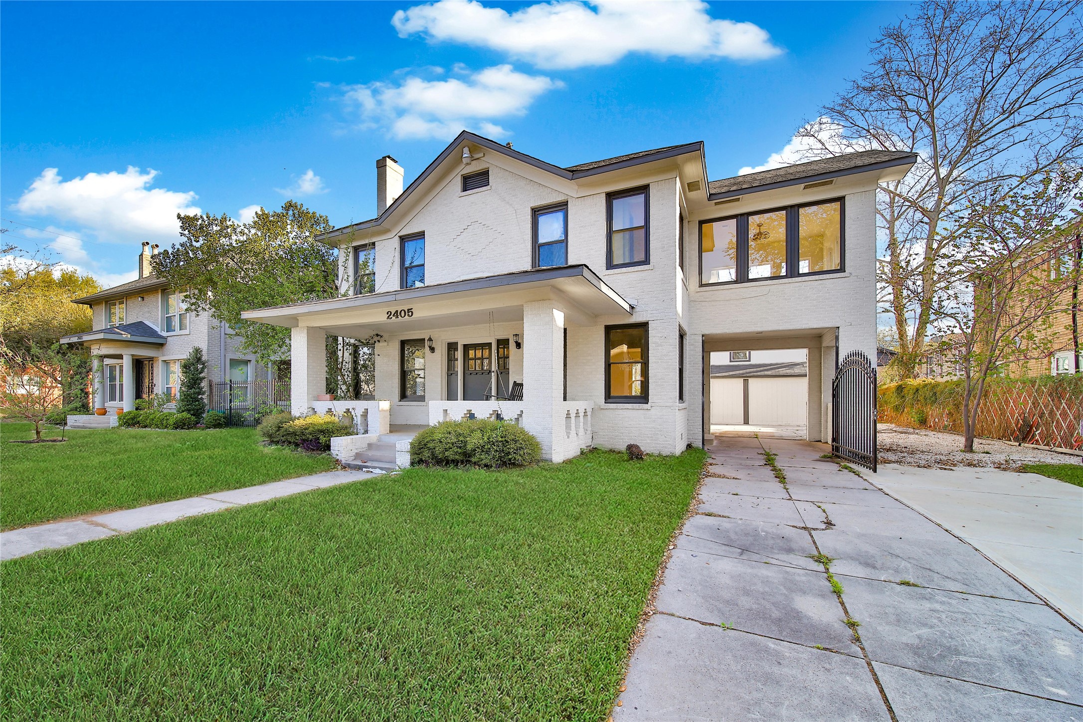2405 Arbor Street Houston, TX 77004 - Photo 2 of 41 a front view of a house with a garden and yard