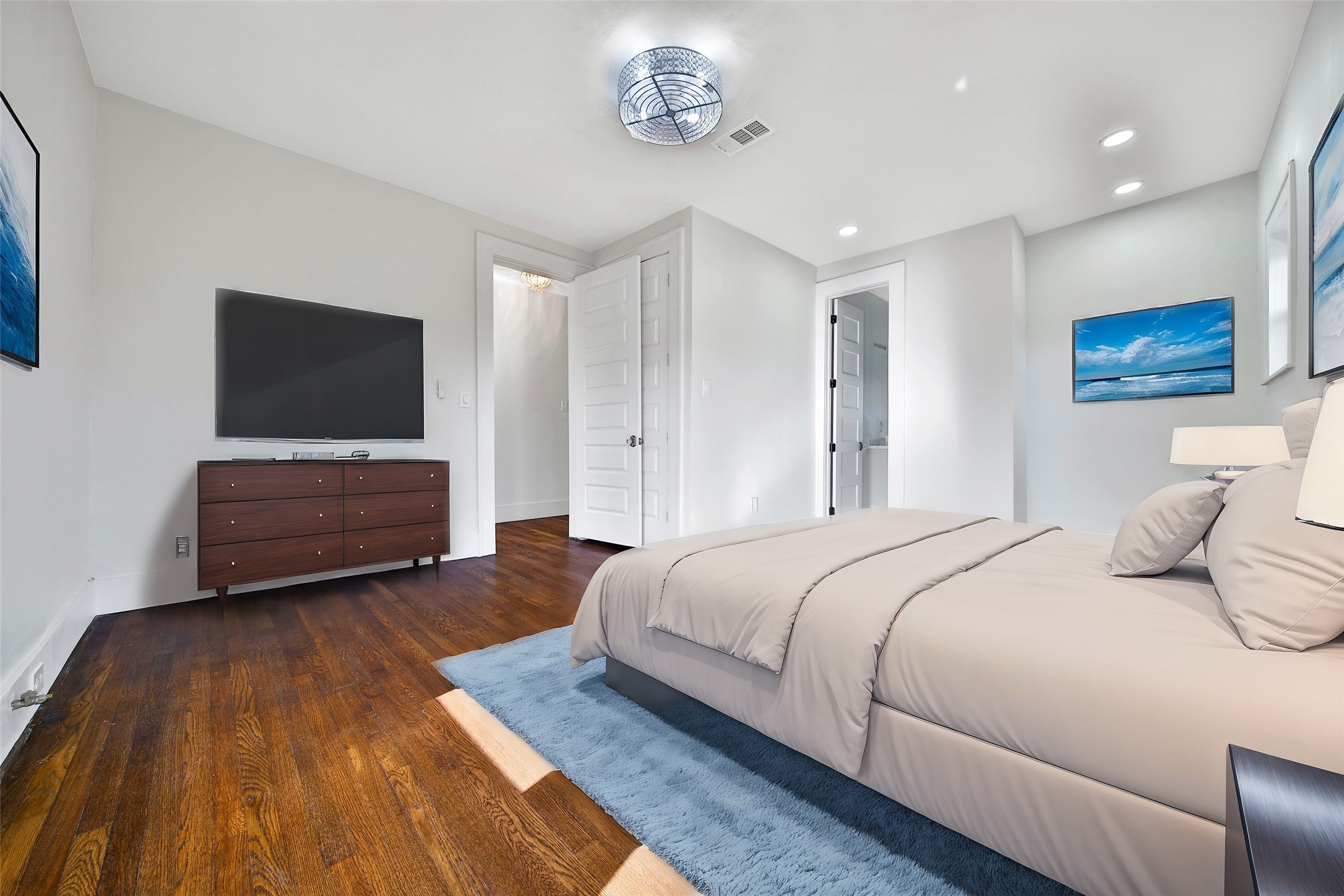 2405 Arbor Street Houston, TX 77004 - Photo 21 of 41 a bedroom with a bed and a television