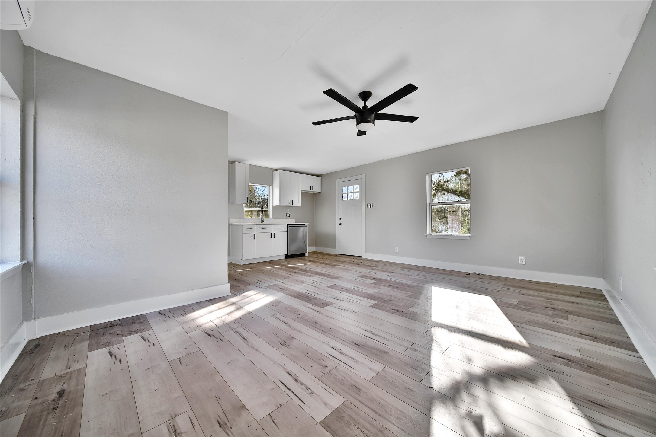 2405 Arbor Street Houston, TX 77004 - Photo 37 of 41 a view of empty room with wooden floor and window