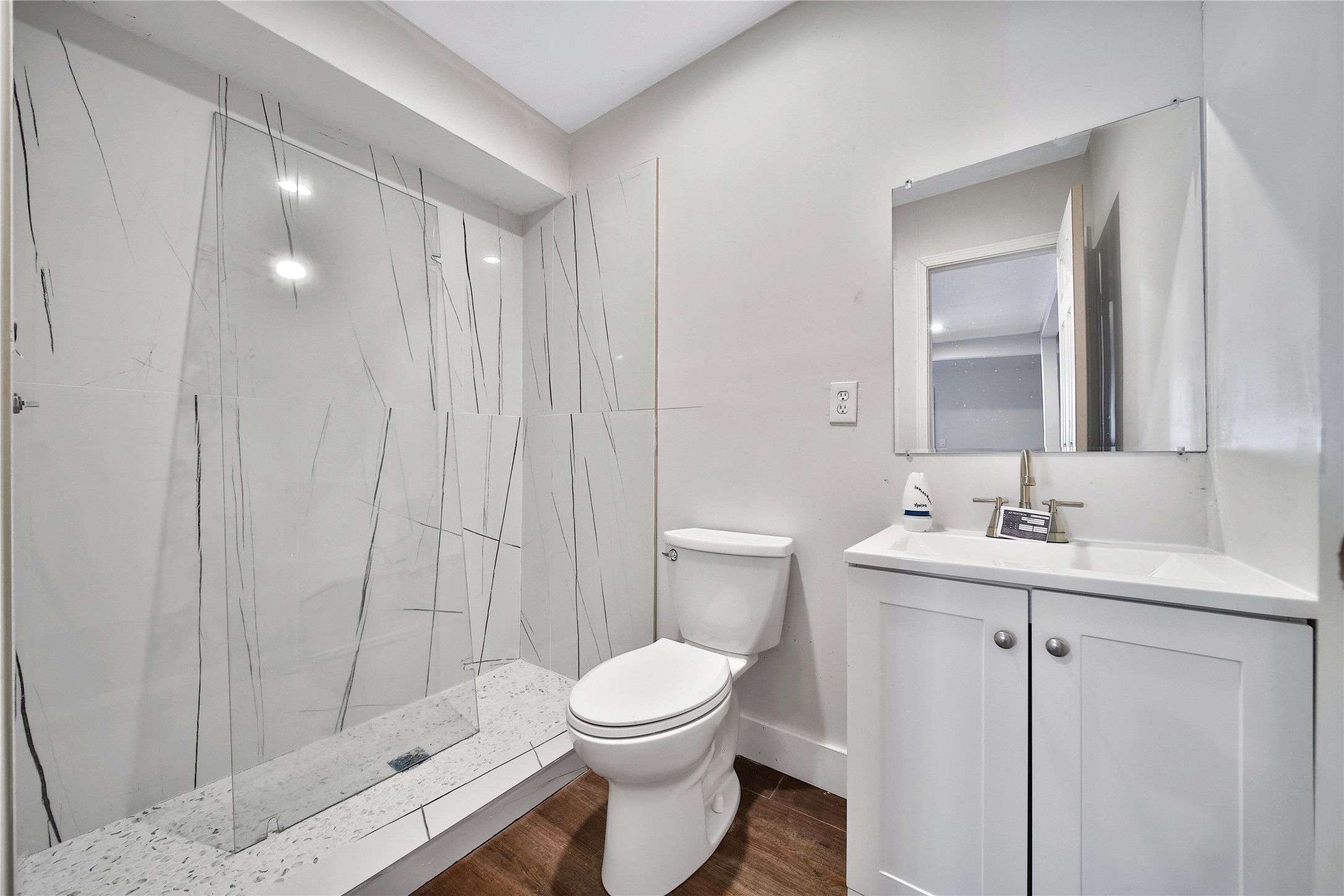 2405 Arbor Street Houston, TX 77004 - Photo 41 of 41 a bathroom with a toilet a sink and mirror