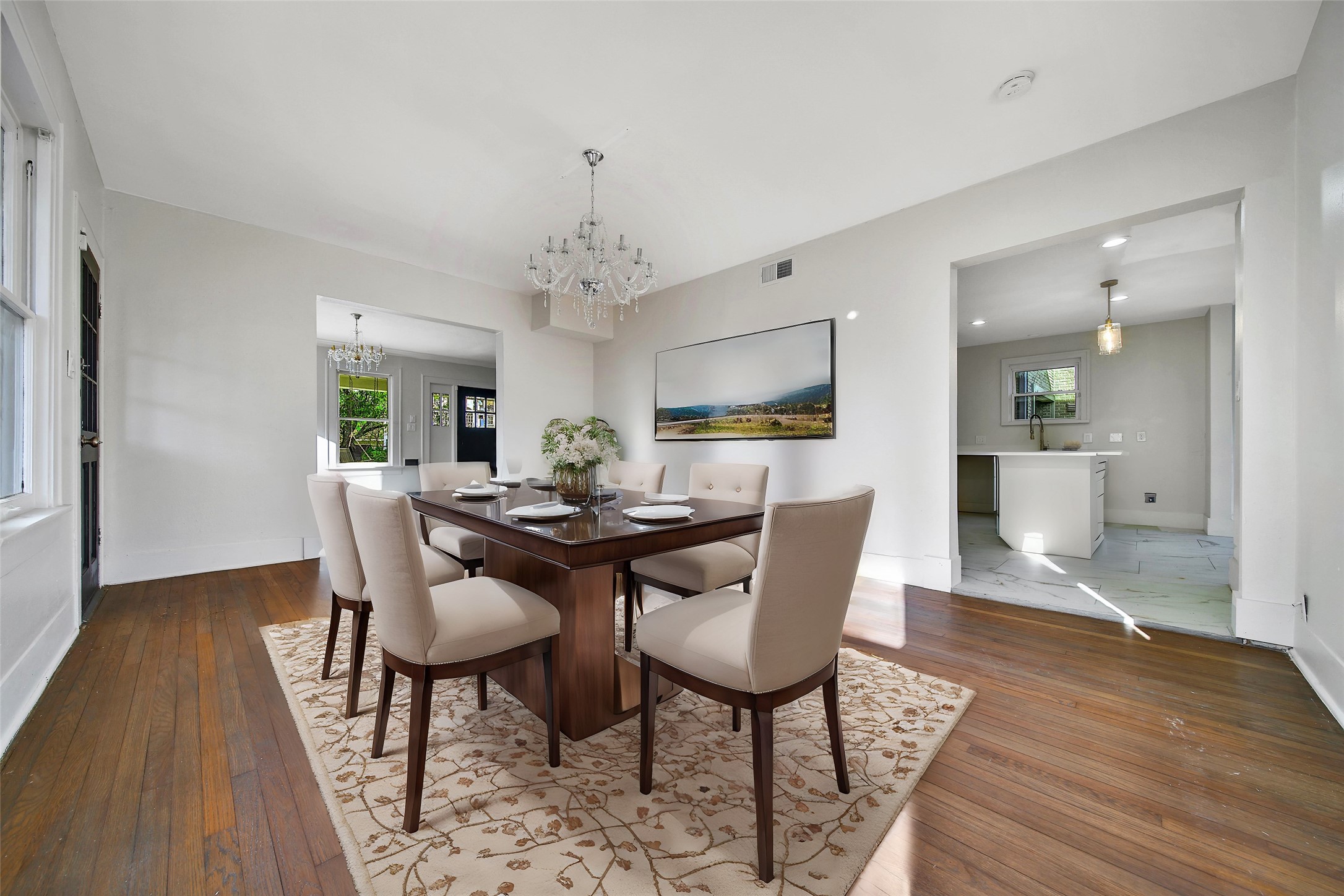 2405 Arbor Street Houston, TX 77004 - Photo 10 of 41 a view of a dining room with furniture and wooden floor