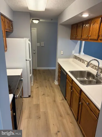 an empty room with window and door