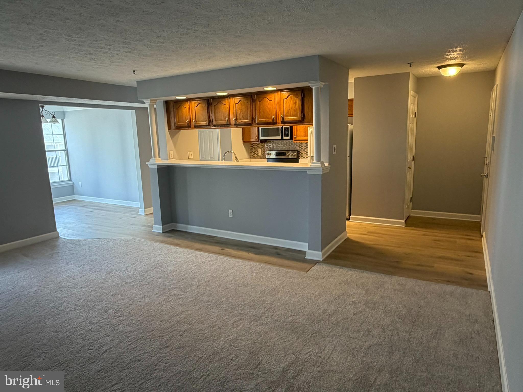 1401 F Sage Lane Belcamp, MD 21017 - Photo 12 of 30 an empty room with window and door