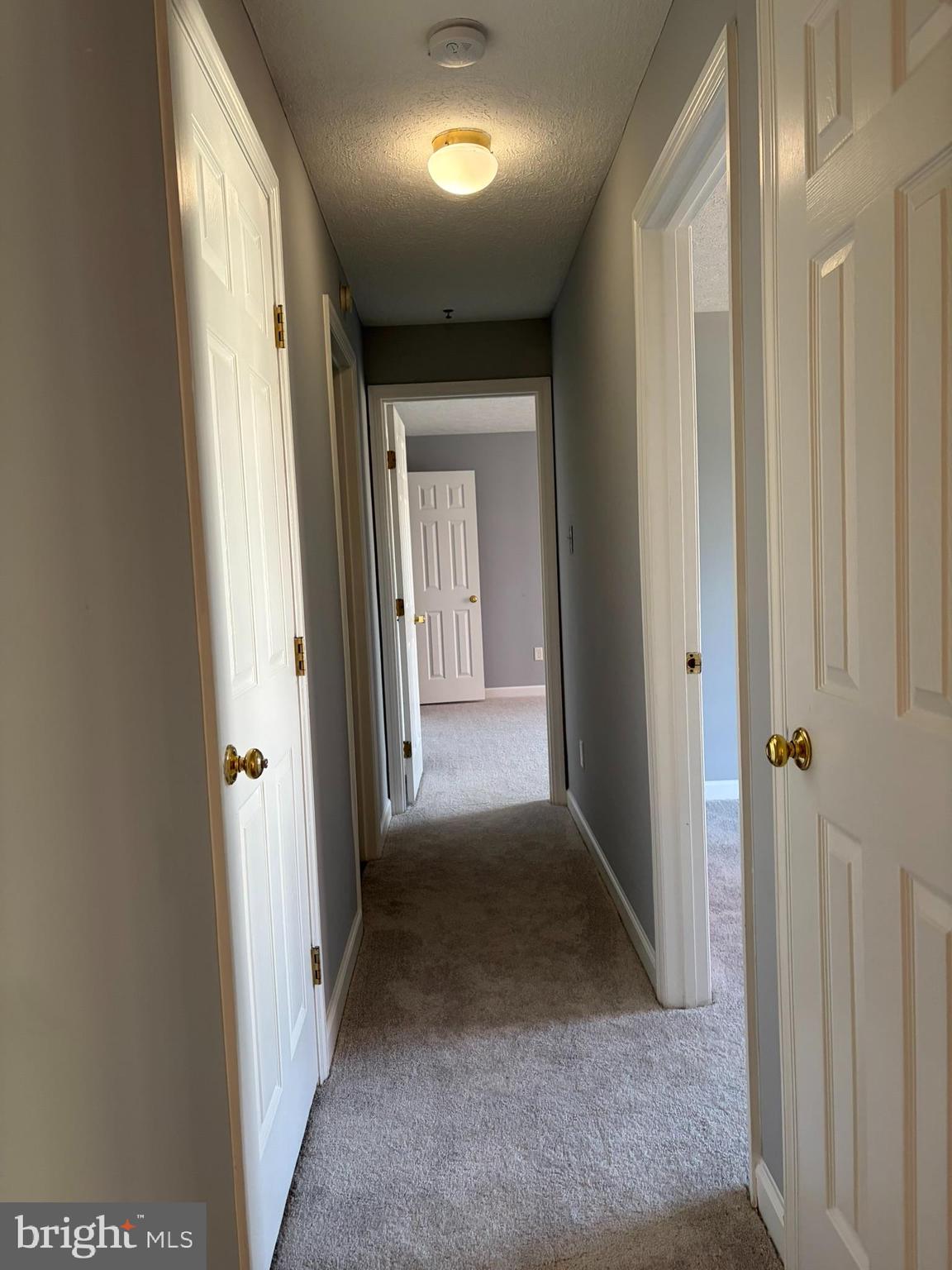 1401 F Sage Lane Belcamp, MD 21017 - Photo 18 of 30 a view of a hallway with wooden floor