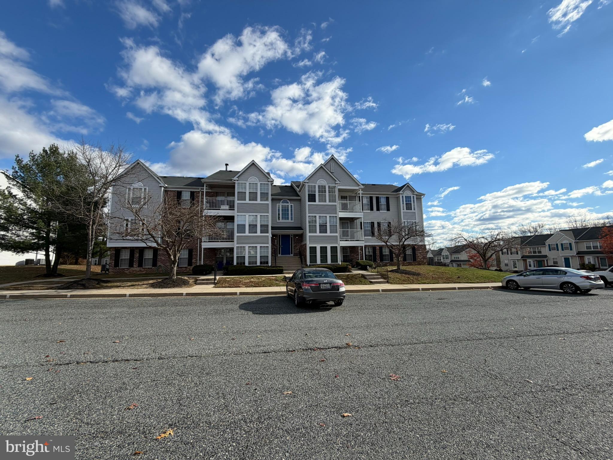 1401 F Sage Lane Belcamp, MD 21017 - Photo 2 of 30 a view of a street with cars