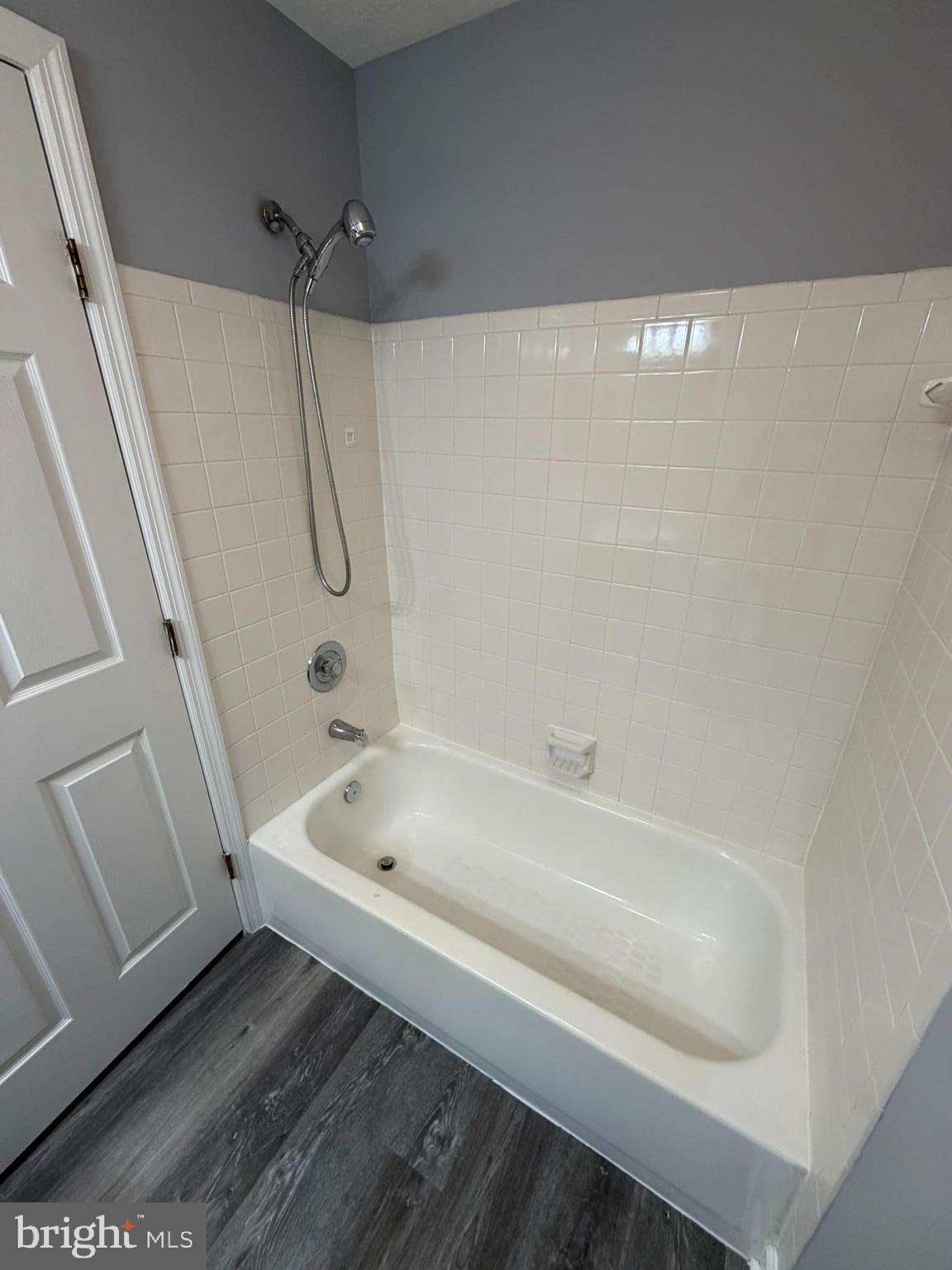 1401 F Sage Lane Belcamp, MD 21017 - Photo 22 of 30 a bathroom with a bathtub