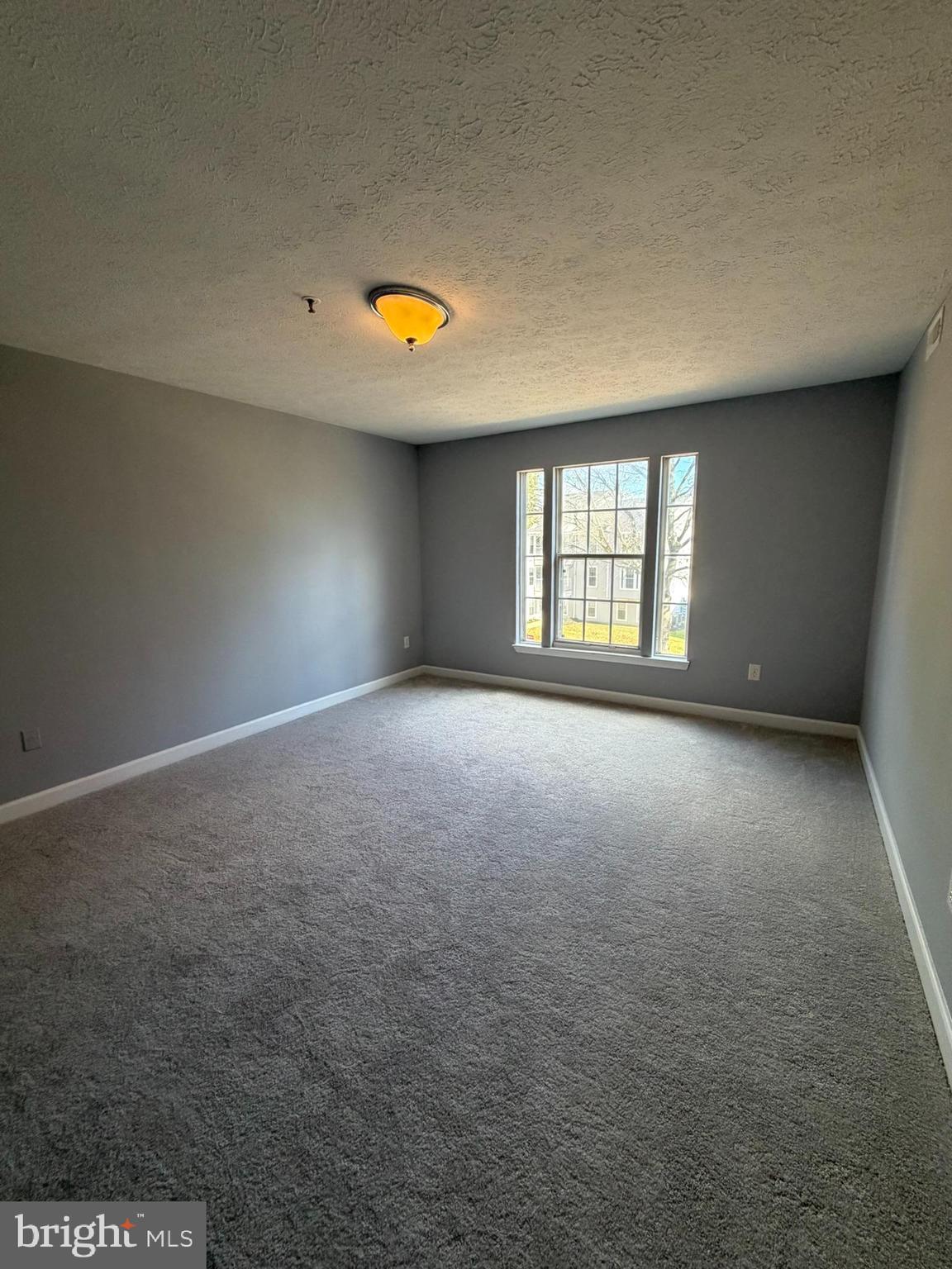 1401 F Sage Lane Belcamp, MD 21017 - Photo 23 of 30 a view of an empty room with a window