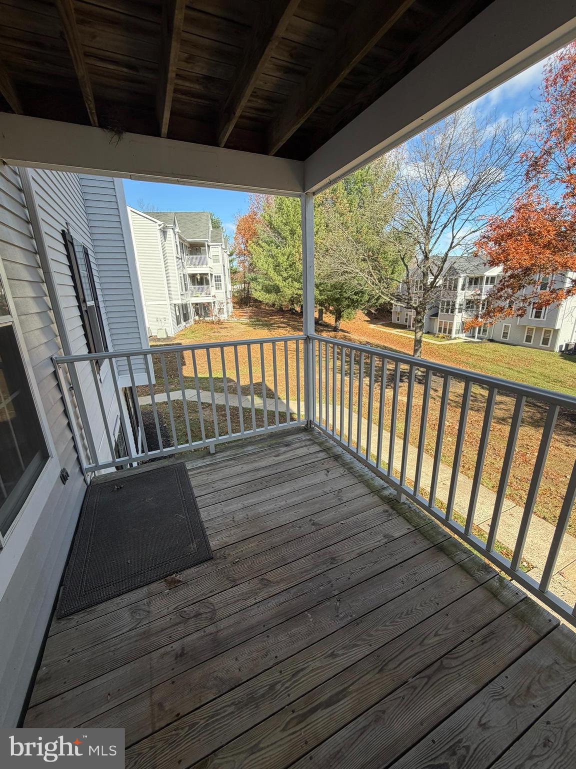 1401 F Sage Lane Belcamp, MD 21017 - Photo 4 of 30 a view of balcony with wooden floor