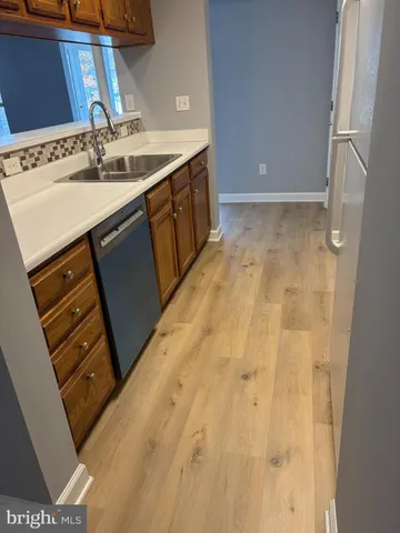 a bathroom with a sink and mirror