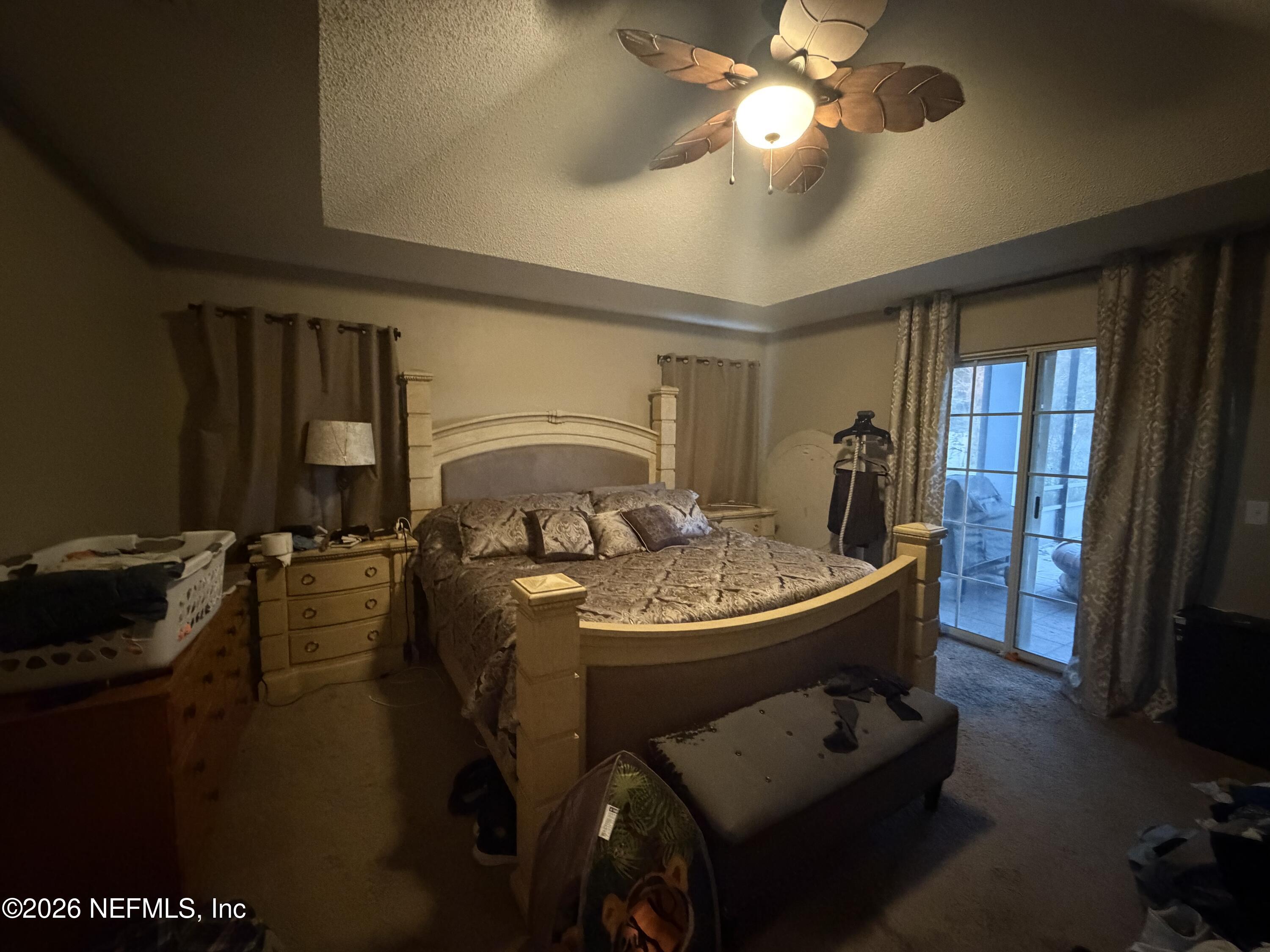 1478 Winston Lane Fleming Island, FL 32003 - Photo 7 of 15 a living room with furniture and a flat screen tv