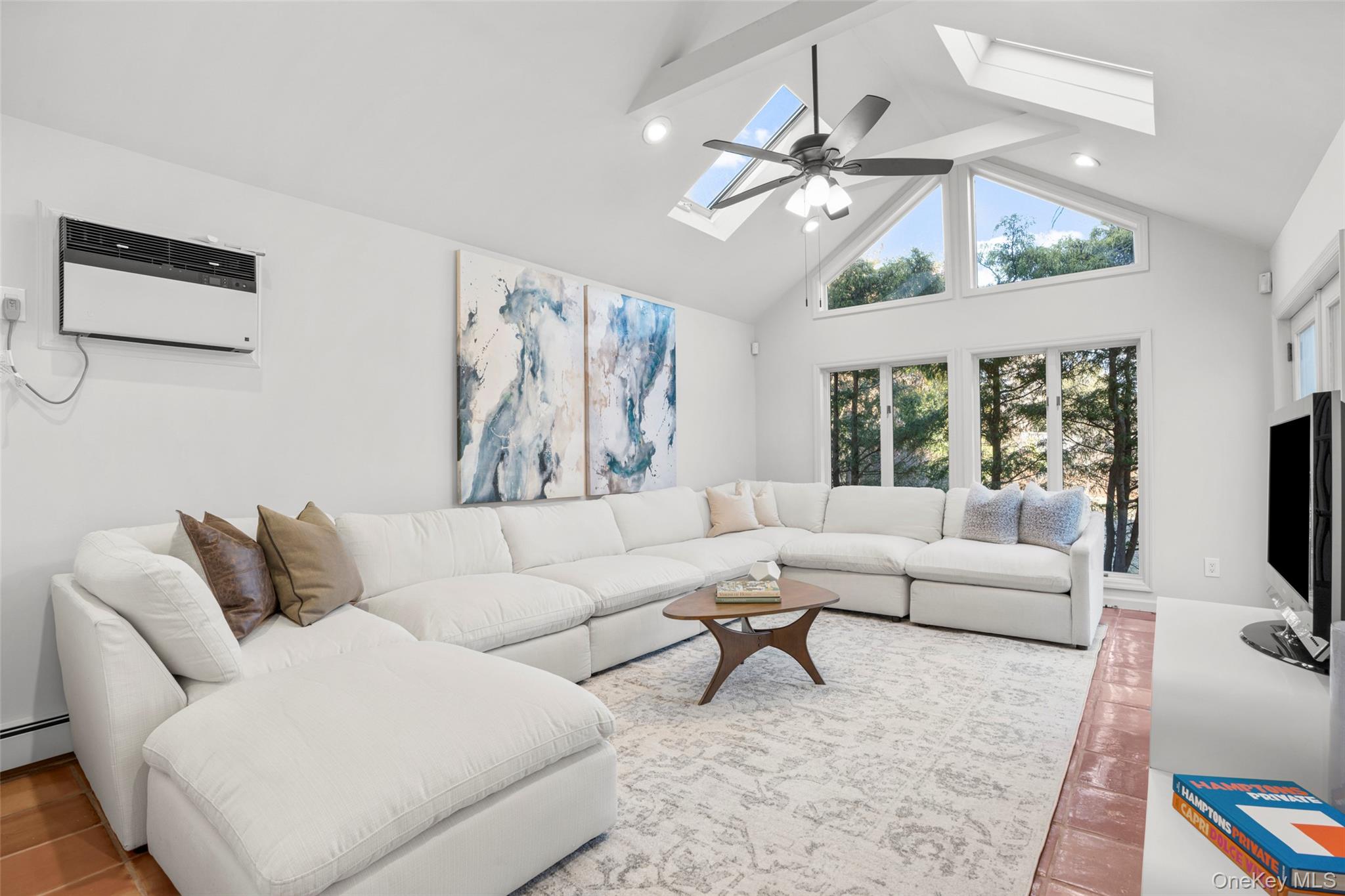 151 Hilburn Road Scarsdale, NY 10583 - Photo 15 of 40 a living room with furniture and a flat screen tv