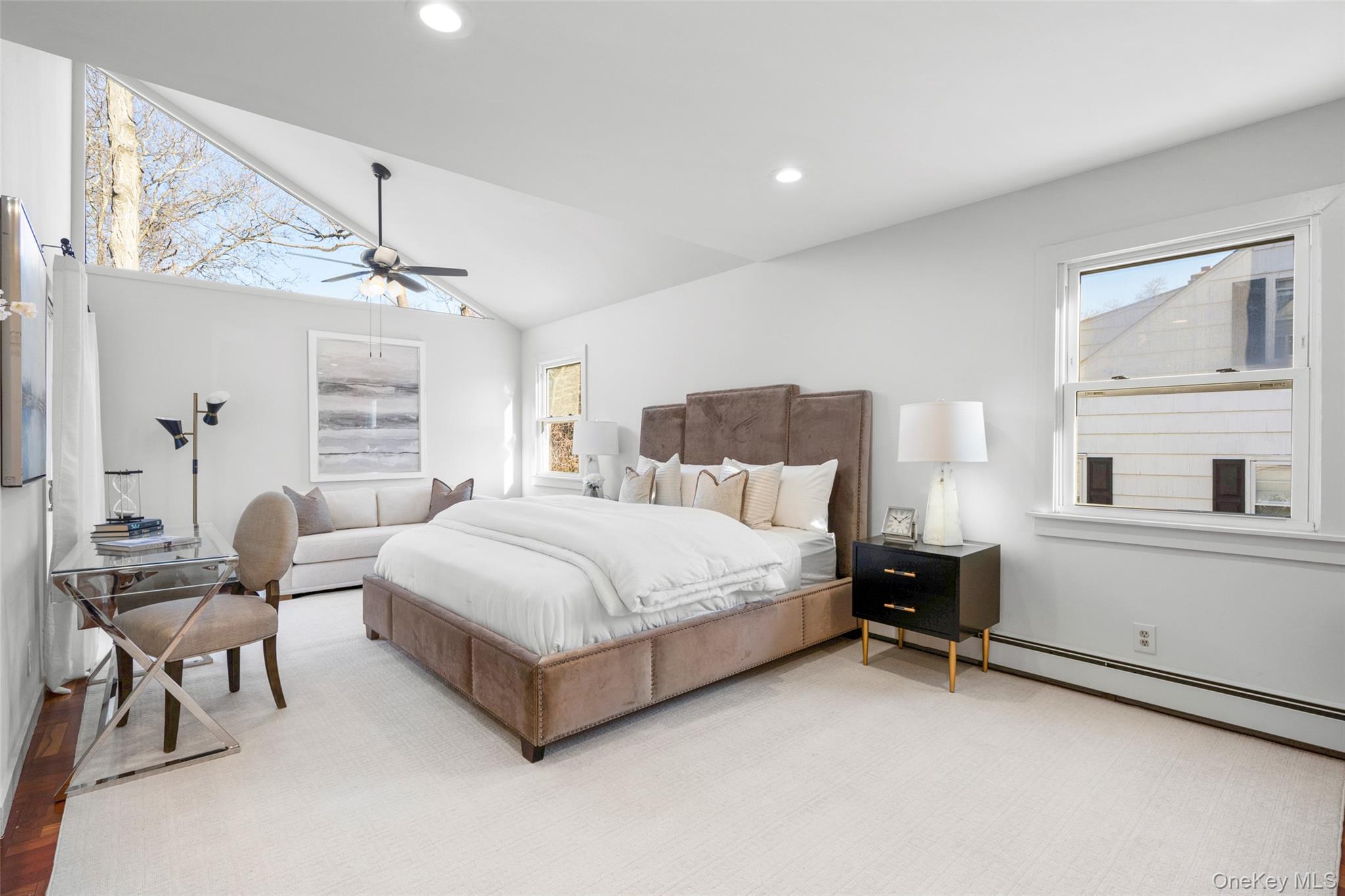 151 Hilburn Road Scarsdale, NY 10583 - Photo 18 of 40 a spacious bedroom with a bed and window