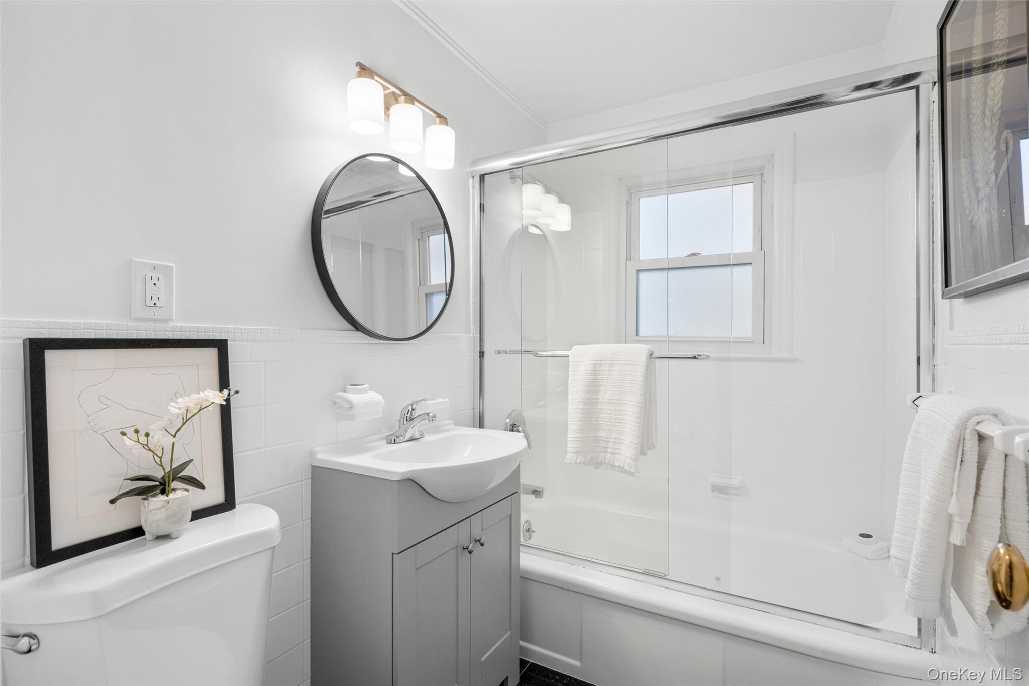 151 Hilburn Road Scarsdale, NY 10583 - Photo 22 of 40 a bathroom with a sink toilet and shower