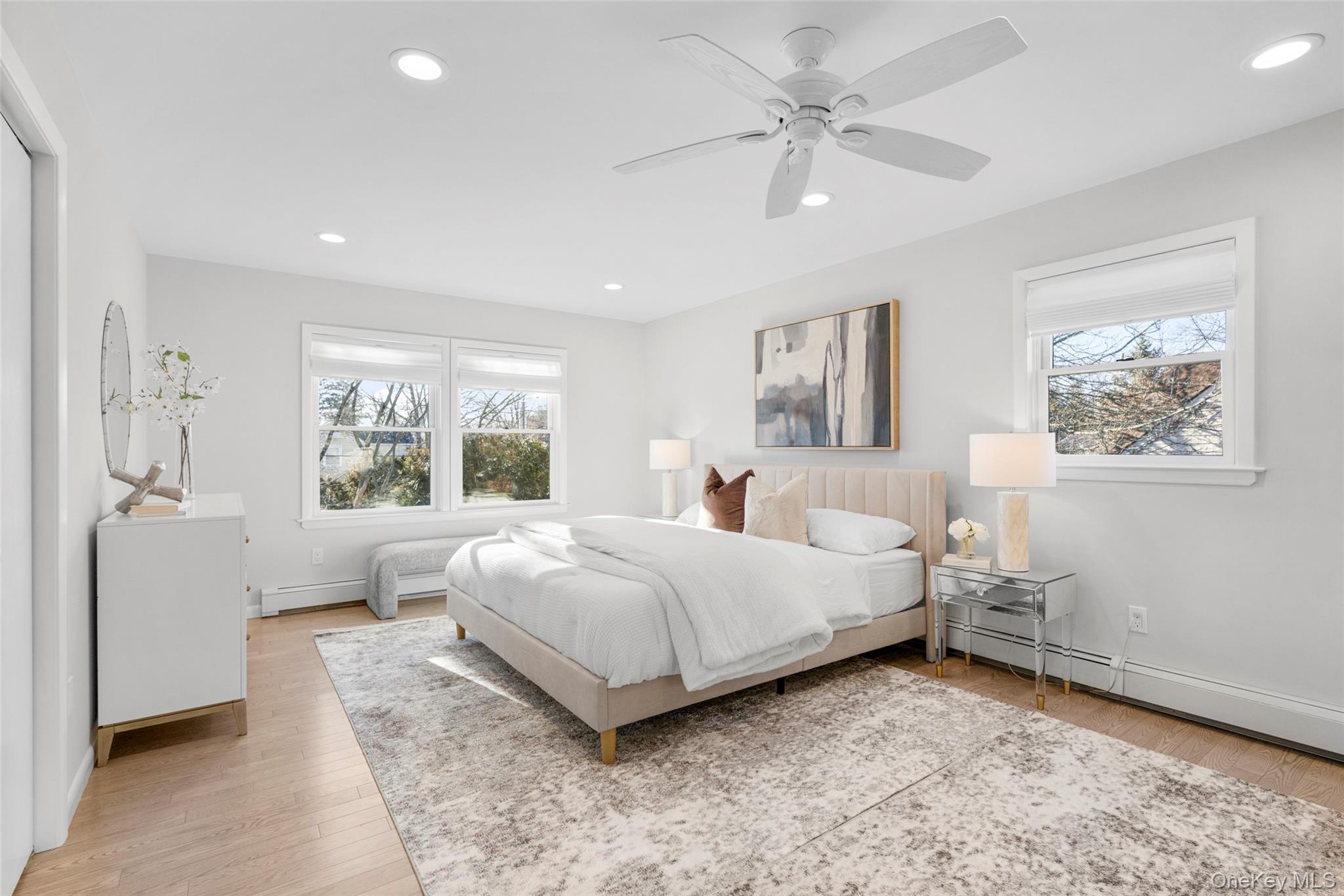 151 Hilburn Road Scarsdale, NY 10583 - Photo 23 of 40 a bedroom with a large bed and a window