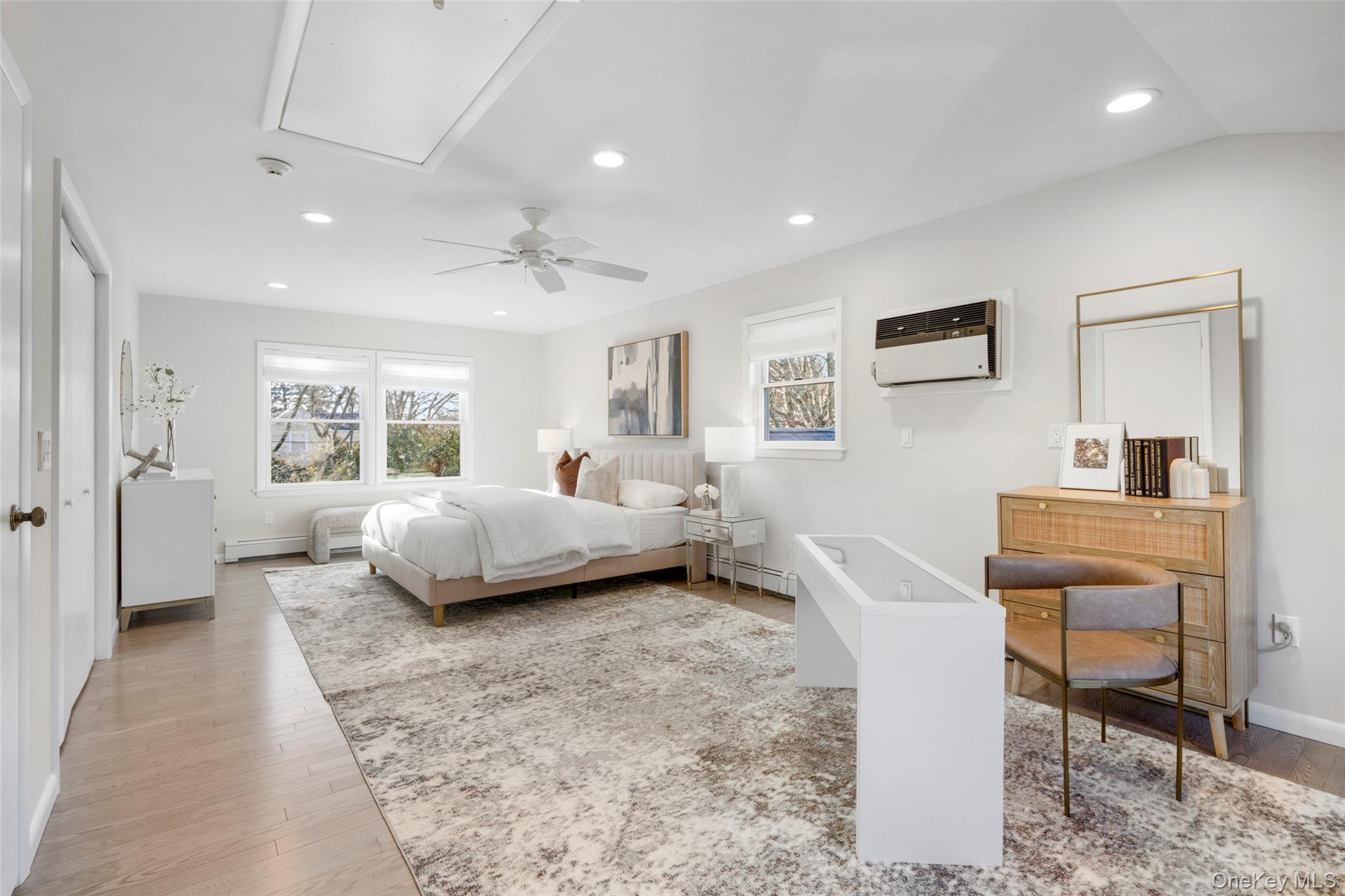 151 Hilburn Road Scarsdale, NY 10583 - Photo 26 of 40 a bedroom with a large bed and a window