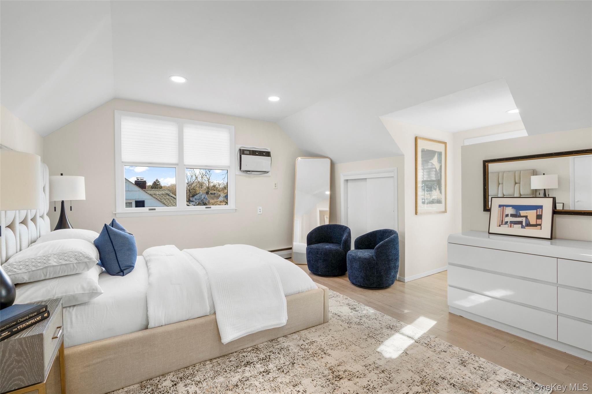 151 Hilburn Road Scarsdale, NY 10583 - Photo 29 of 40 a bedroom with a large bed and furniture