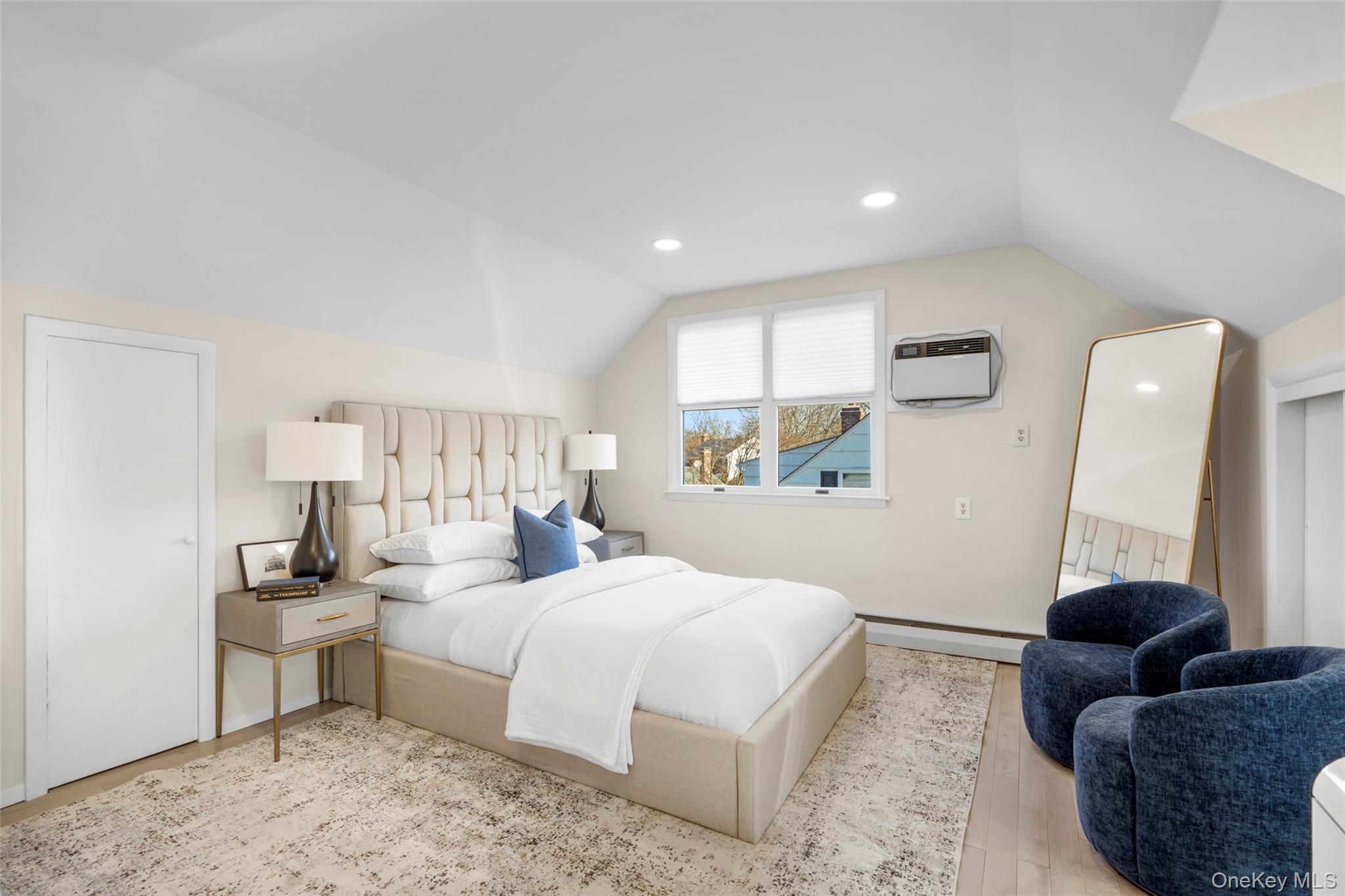 151 Hilburn Road Scarsdale, NY 10583 - Photo 31 of 40 a bedroom with a bed and a couch