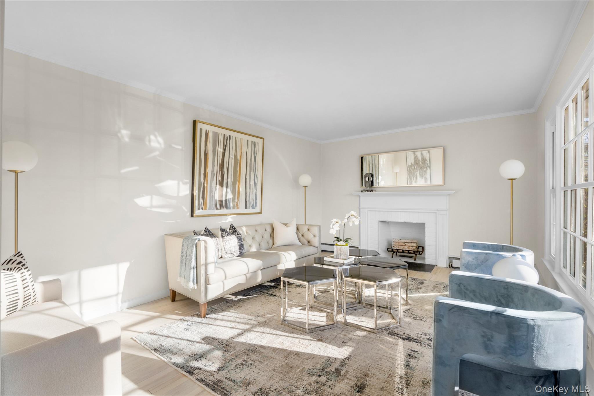 151 Hilburn Road Scarsdale, NY 10583 - Photo 4 of 40 a living room with furniture and a lamp