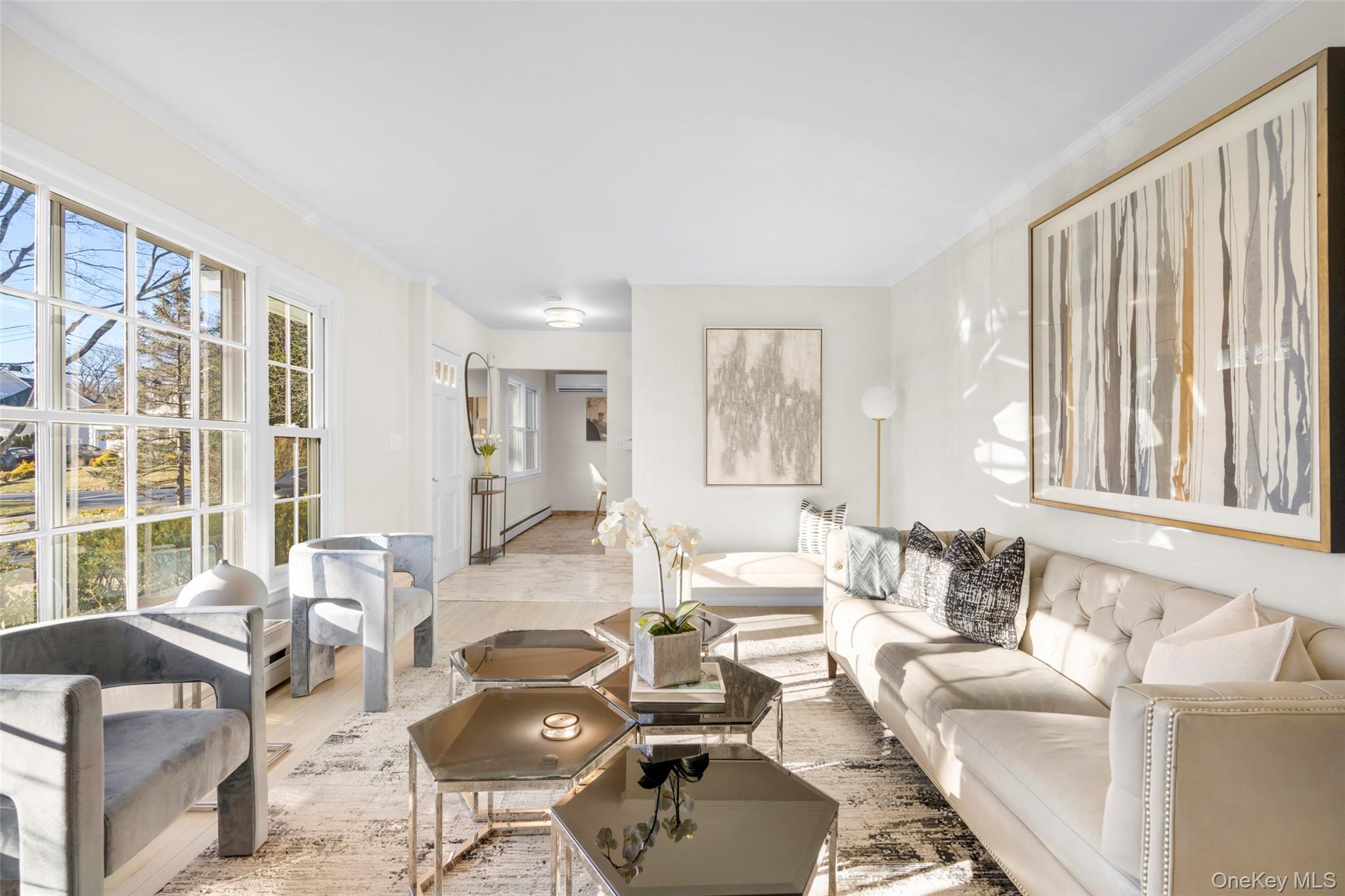 151 Hilburn Road Scarsdale, NY 10583 - Photo 7 of 40 a living room with furniture and floor to ceiling windows