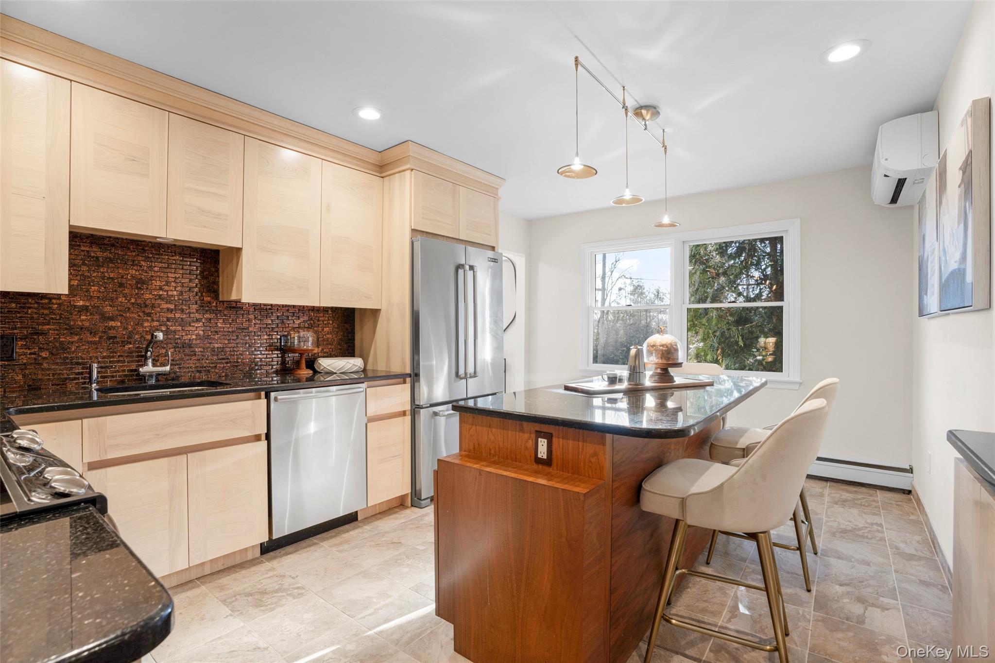 151 Hilburn Road Scarsdale, NY 10583 - Photo 8 of 40 a kitchen with stainless steel appliances kitchen island granite countertop a sink and cabinets