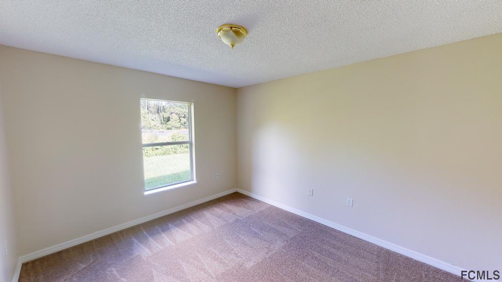 75 Raintree Place Palm Coast, FL 32164 - Photo 15 of 31 BEDROOM 1 OF 3