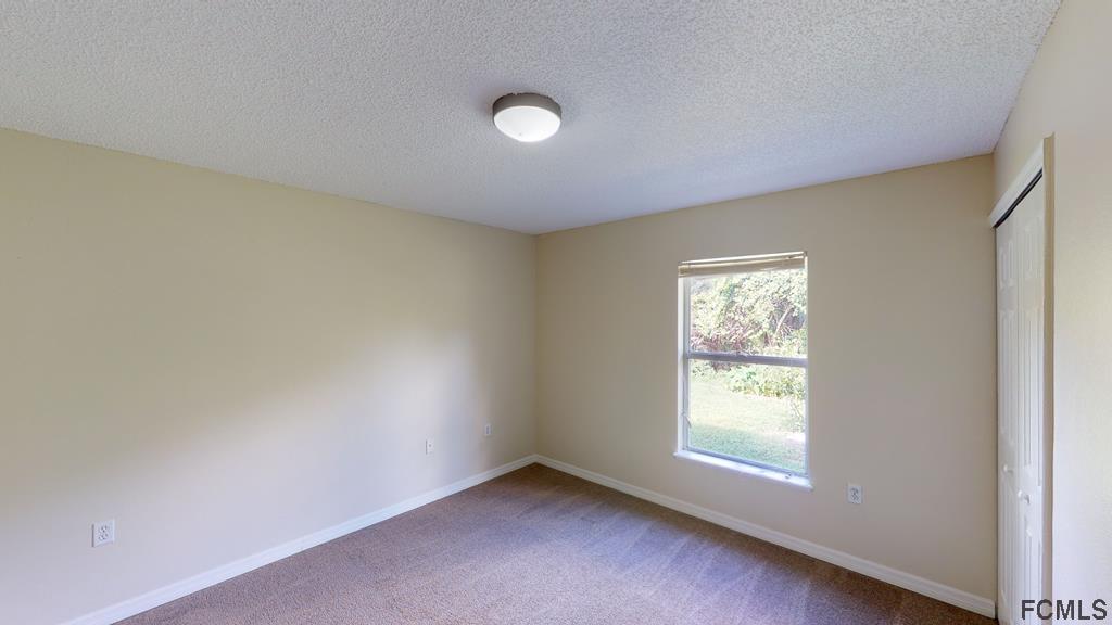 75 Raintree Place Palm Coast, FL 32164 - Photo 18 of 31 BEDROOM 2 OF 3