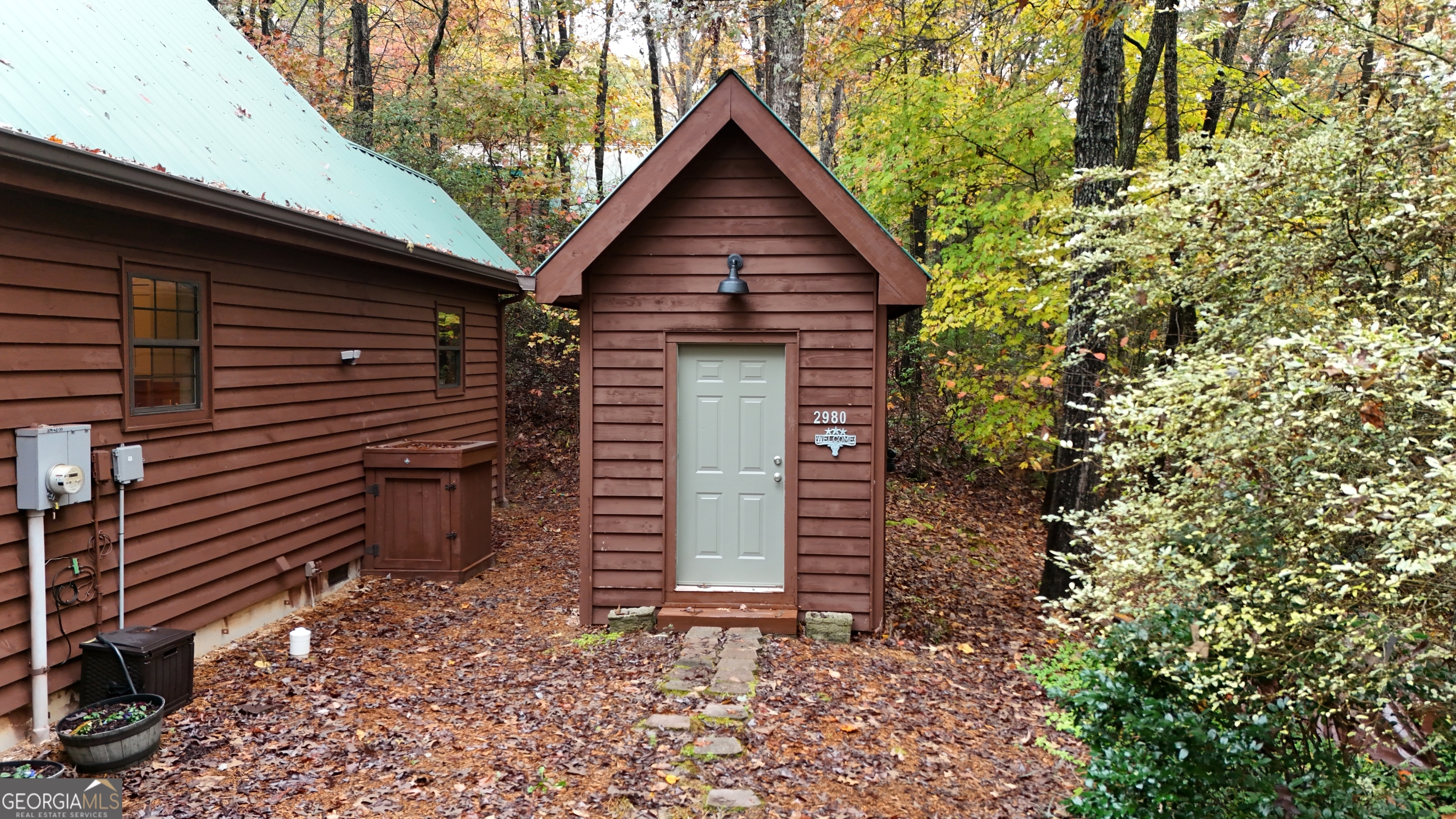 2980 Sky Lake Road Sautee Nacoochee, GA 30571 - Photo 19 of 22 a backyard of a house with lots of green space