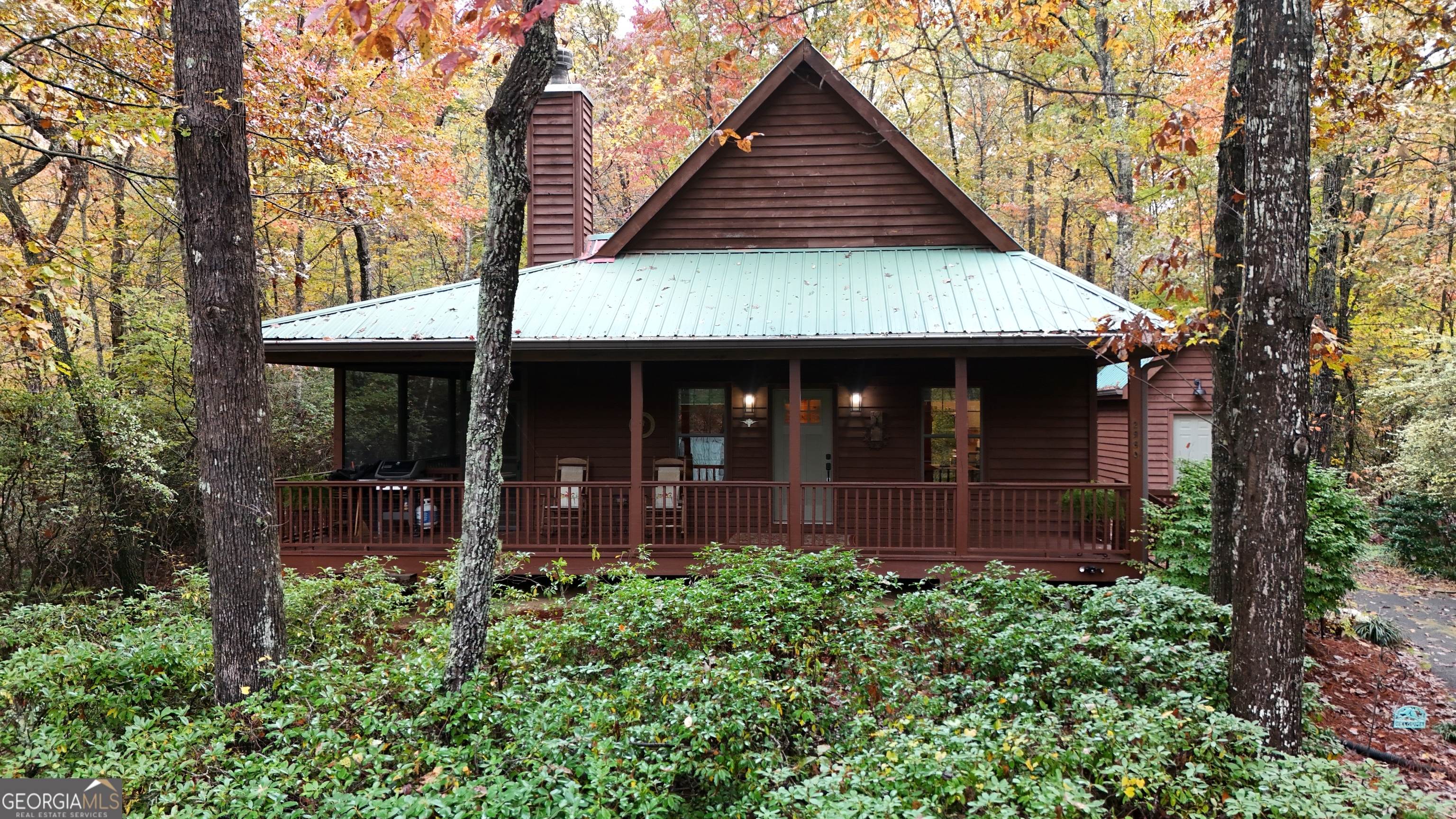 2980 Sky Lake Road Sautee Nacoochee, GA 30571 - Photo 2 of 22 front view of a house with a small yard