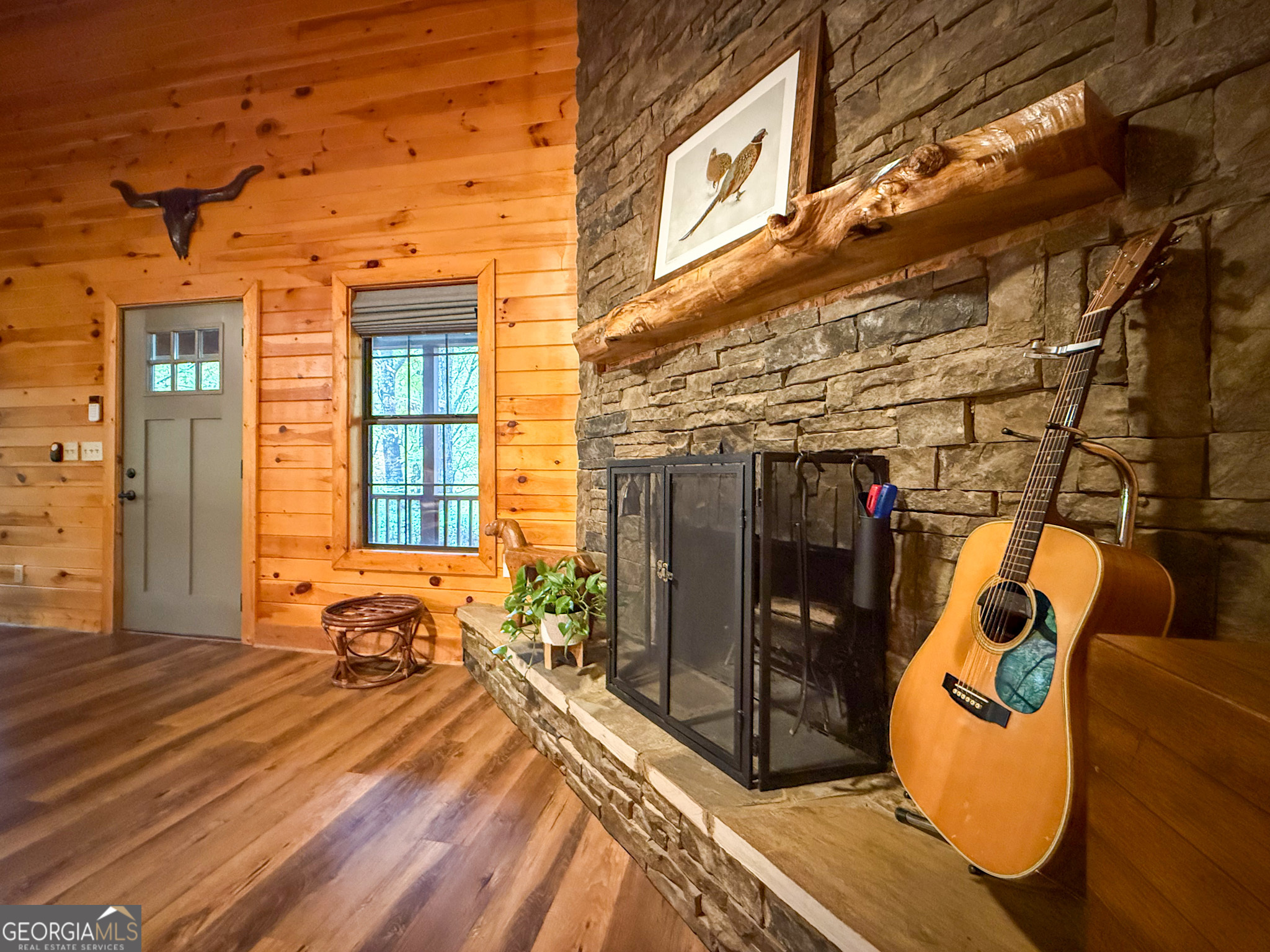 2980 Sky Lake Road Sautee Nacoochee, GA 30571 - Photo 5 of 22 a view of a patio with a table and chairs