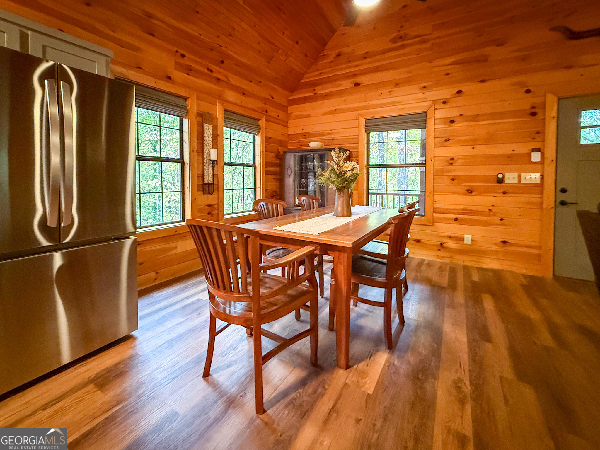 2980 Sky Lake Road Sautee Nacoochee, GA 30571 - Photo 6 of 22 a dining room with furniture and wooden floor