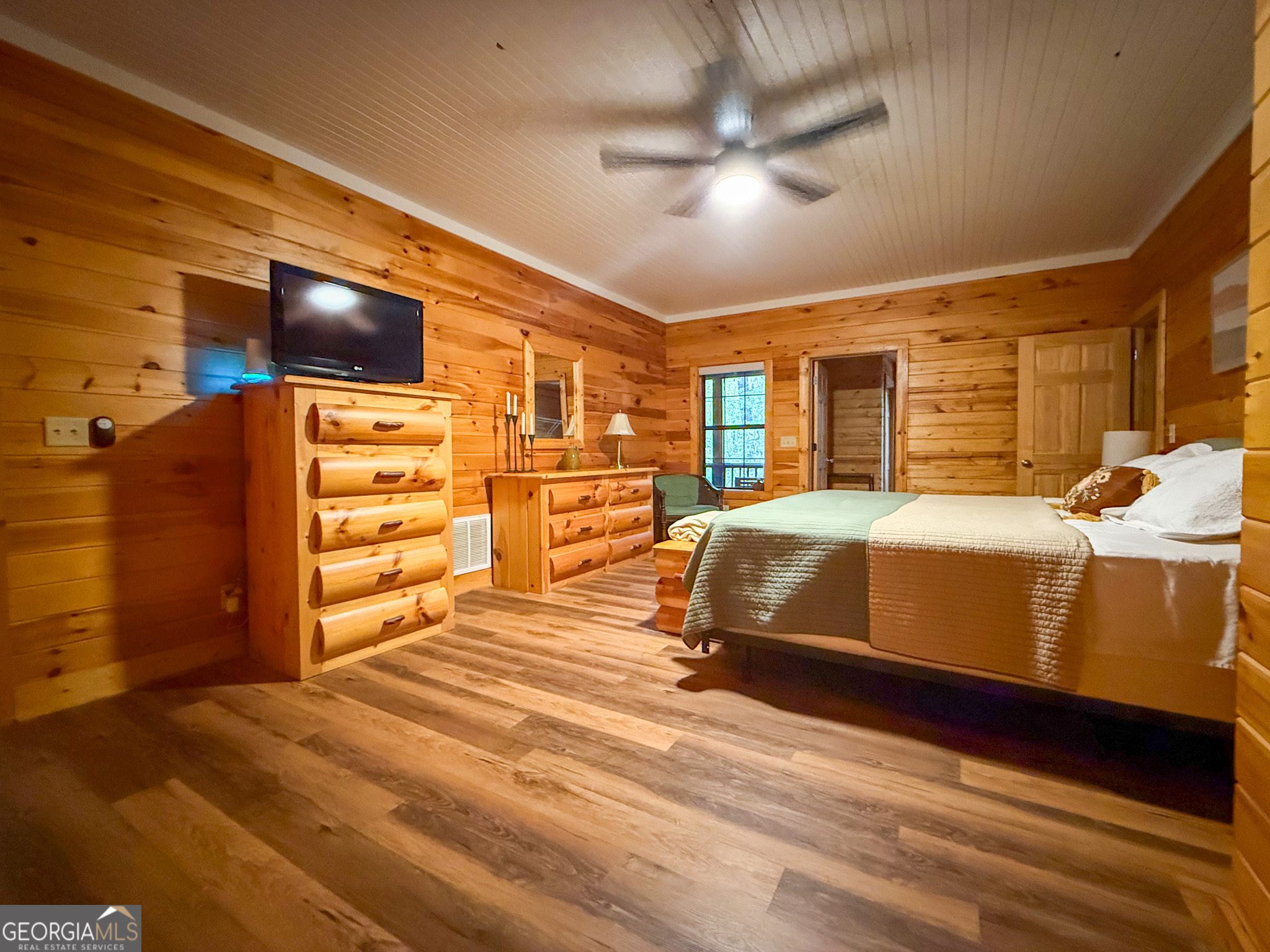 2980 Sky Lake Road Sautee Nacoochee, GA 30571 - Photo 9 of 22 a bedroom with a bed and a walk in closet