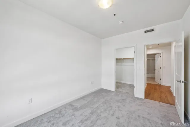 an empty room with a bathroom