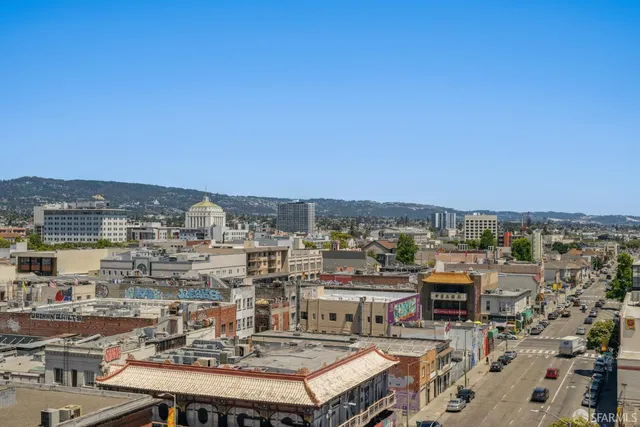 a living room with furniture potted plant and a fireplace