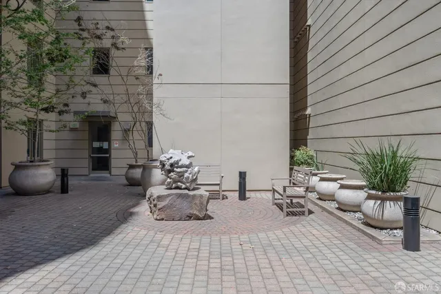 a view of a lobby with a fountain
