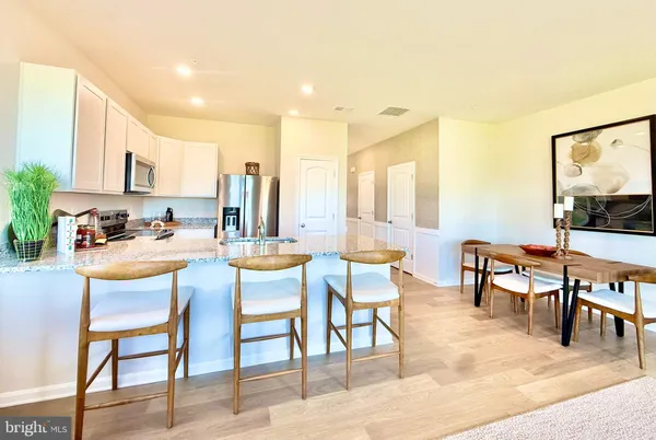 a view of a dining room with furniture